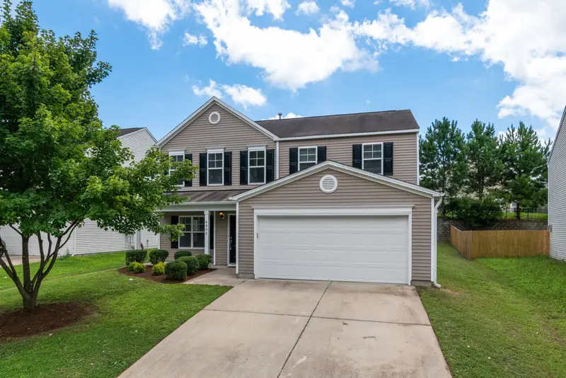 Garage door repair Columbus MN: suburban home with an attached garage door